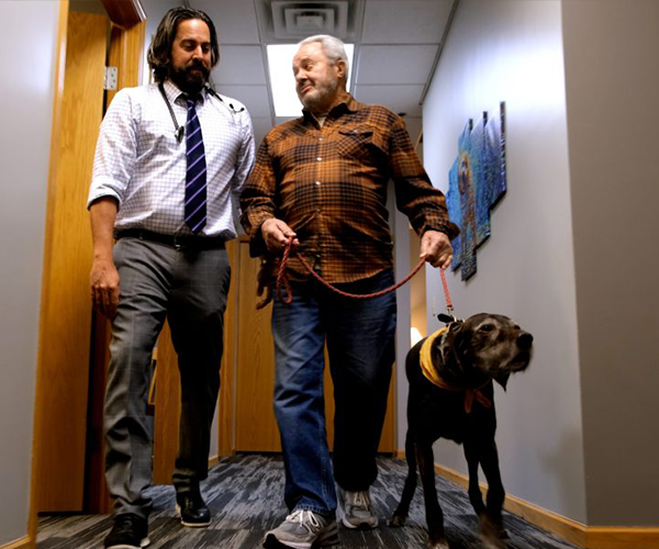 vet team and pet owner